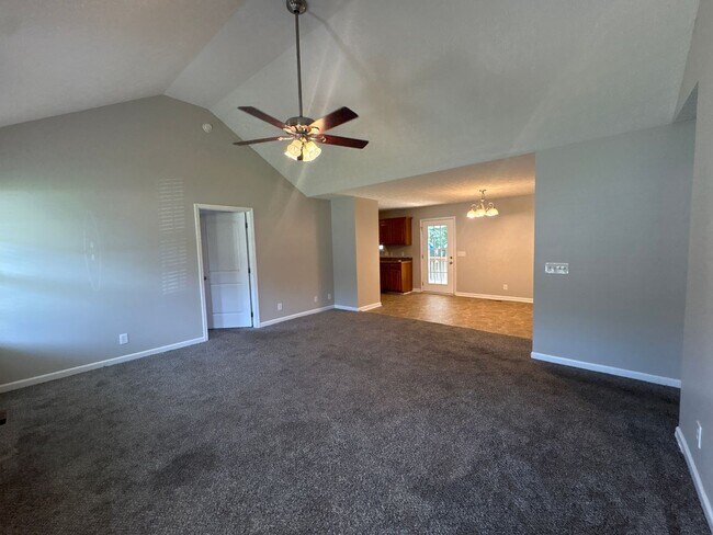 Building Photo - Charming Home with Covered Back Deck and Fenced in Yard...