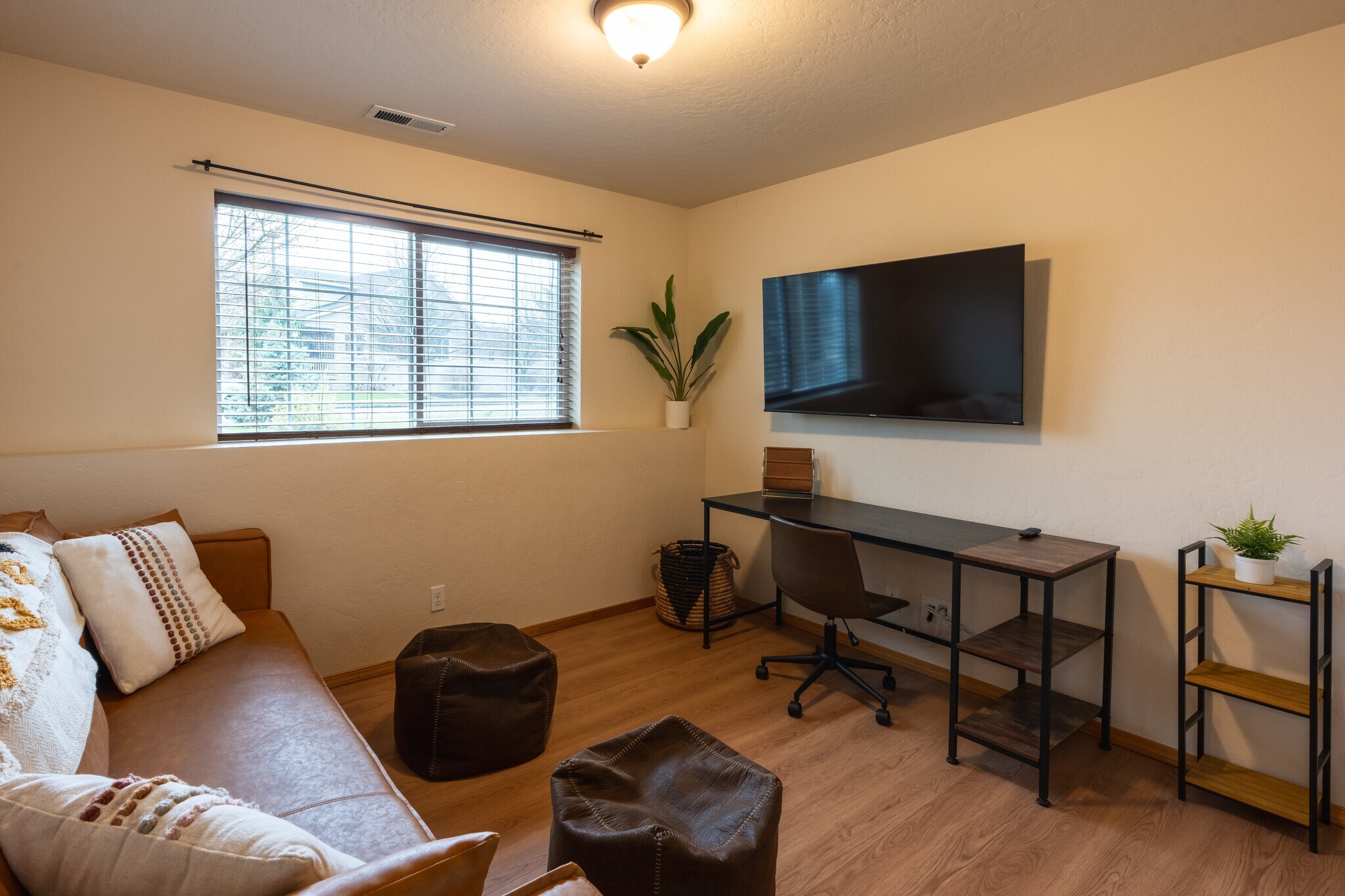 Downstairs - Media room. Work, Study or Play from Home - 55" Smart TV / Roku, can be used as a home - 2805 W Dumont Dr