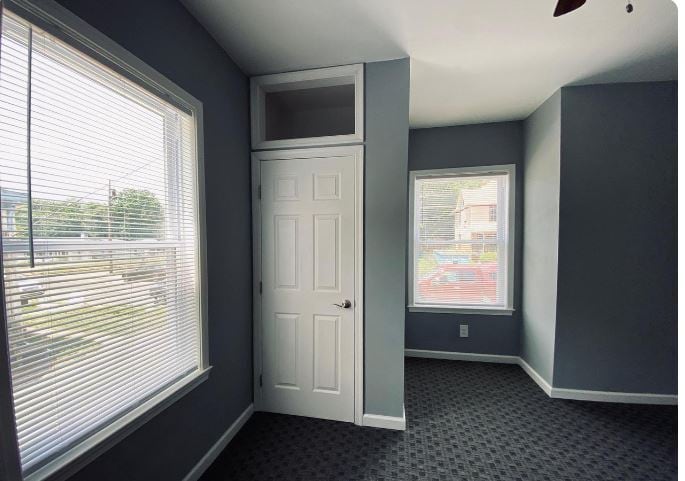 Bright and airy bedroom with ceiling fan - 26 W Center St