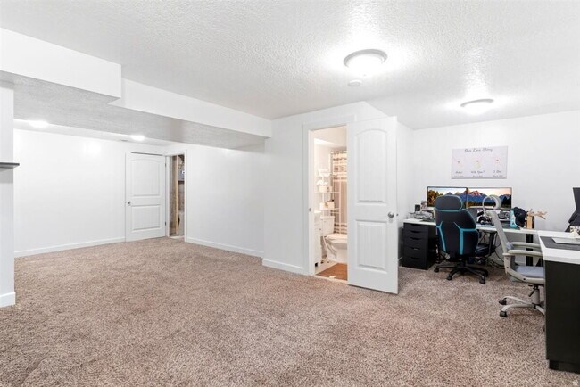 Building Photo - "Spacious 3-Bed Oasis with Fireplace & Modern Vinyl Touches in Ogden"