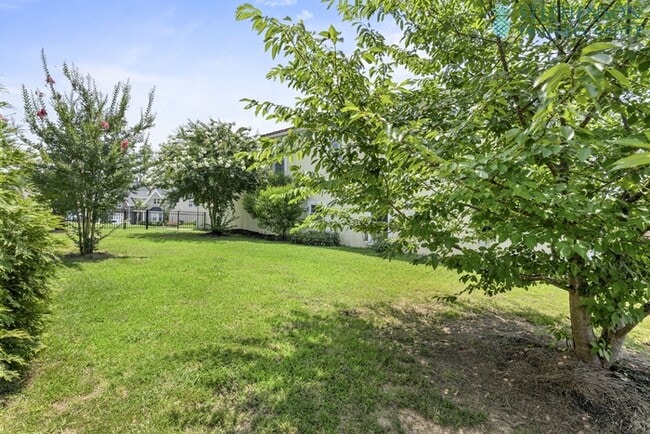Building Photo - Deeded Boat Slip Comes with Home in Gated ...