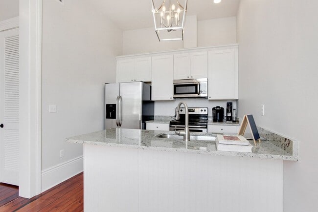 Building Photo - Garden District Living in newly restored Mansion with Private Balcony