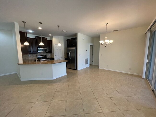 Building Photo - ANNUAL RENTAL - MIRASOL AT COCONUT POINT 3 BED/2 BATH WITH GARAGE
