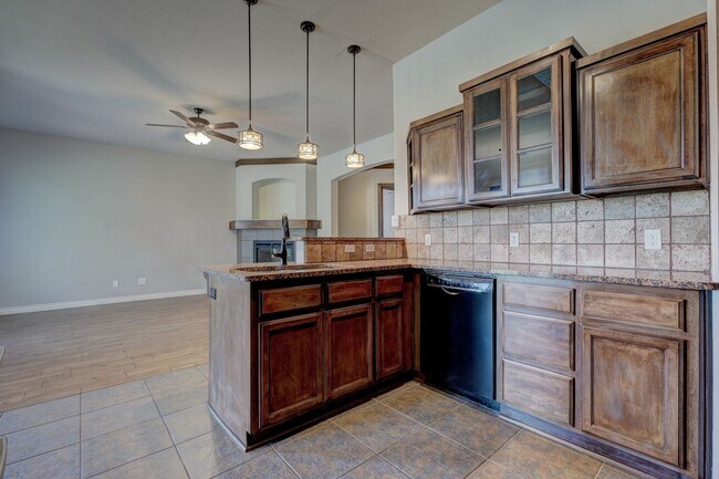 Building Photo - Stunning 3 Bedroom Home with Fireplace, Community Amenities & Open Floor Plan