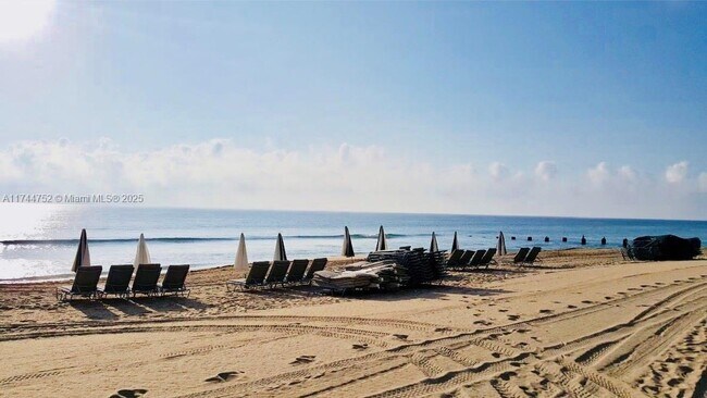 Building Photo - 9801 Collins Ave