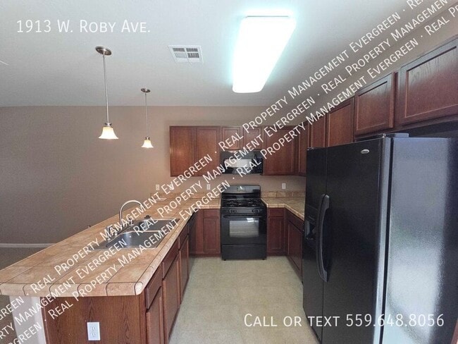 Building Photo - 1913 W Roby Ave