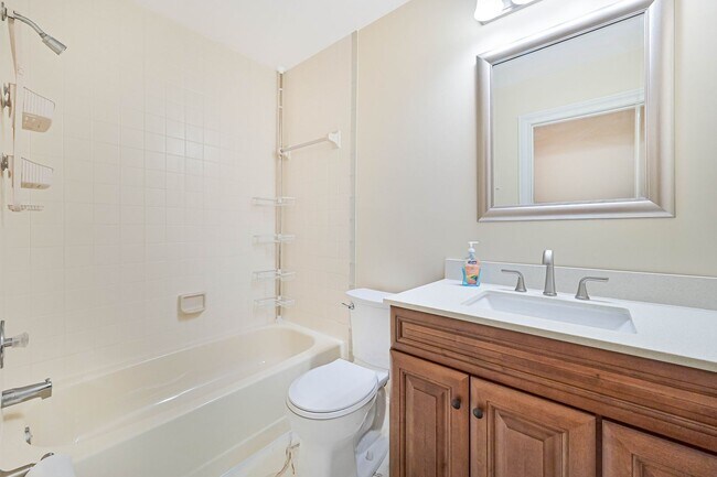Building Photo - NOW AVAILABLE - 2/2 + Den Villa - 2 Car Ga...