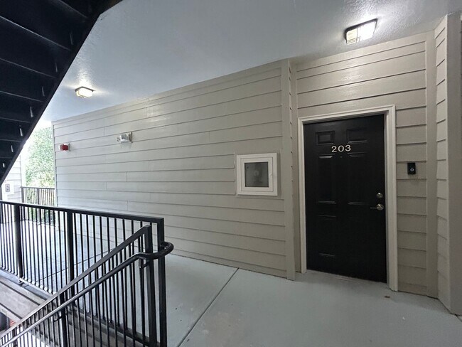 Building Photo - Walk to UF! Spacious & Furnished 3BD Condo...