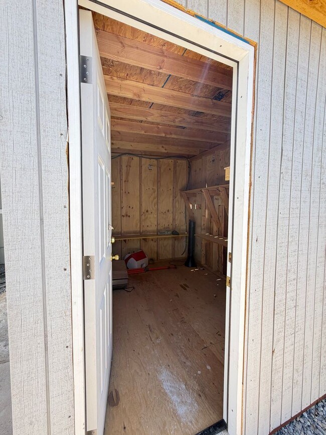 Building Photo - 2 bedroom with outside shed and carport.