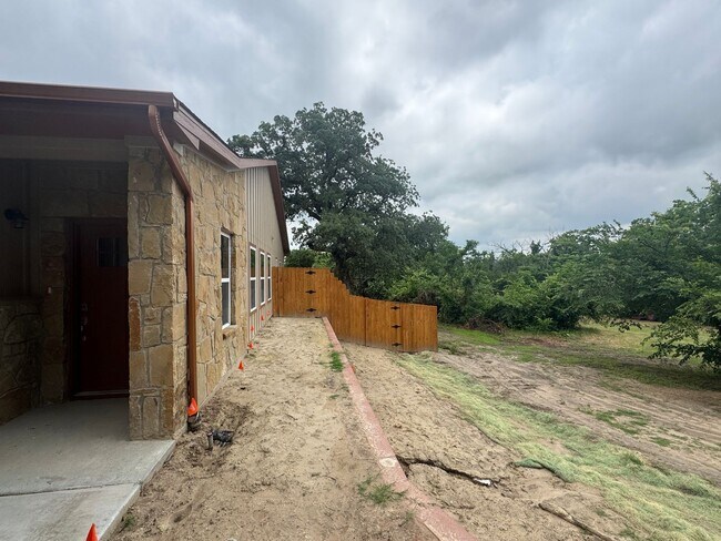 Building Photo - 3/2/2 NEW CONSTRUCTION Spacious YARD WITH ...