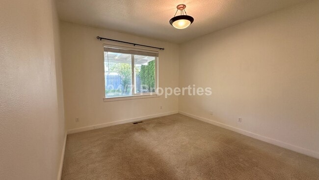 Building Photo - 3 BD | 2 BA Duplex with Fenced Backyard an...