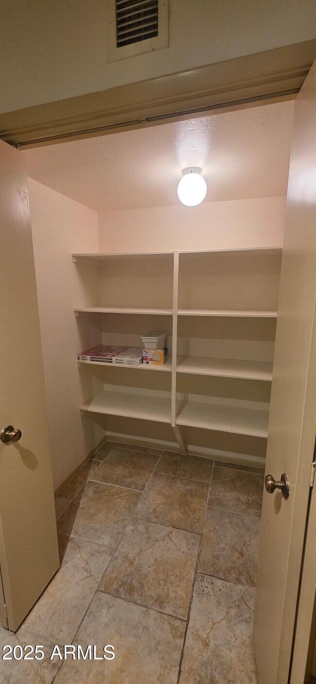 Building Photo - 7744 E Camelback Rd