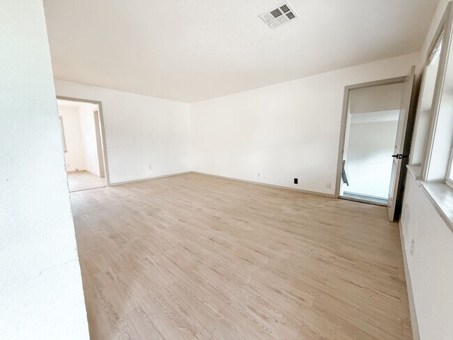 Building Photo - Charming Riverside Home with Modern Upgrad...