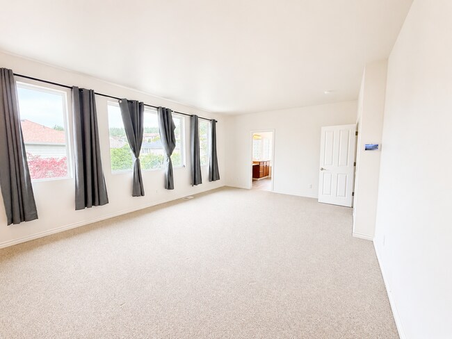 Building Photo - Spacious 4-Bedroom Home with Bonus Room, Trex Deck & Pergola in Prime Maple Valley