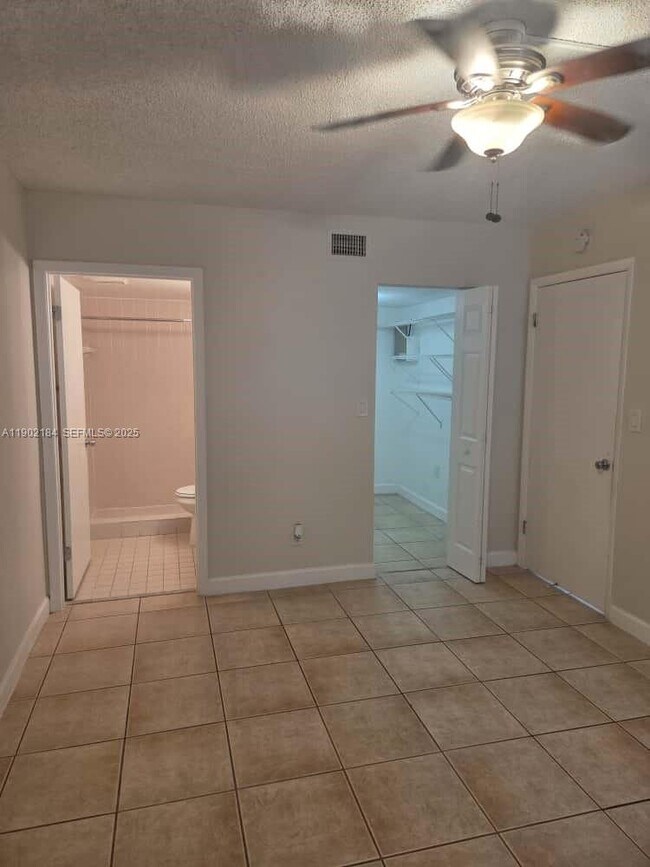 Building Photo - 7406 Woodmont Terrace