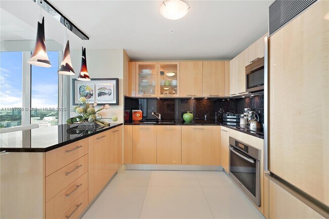 Building Photo - 6899 Collins Ave