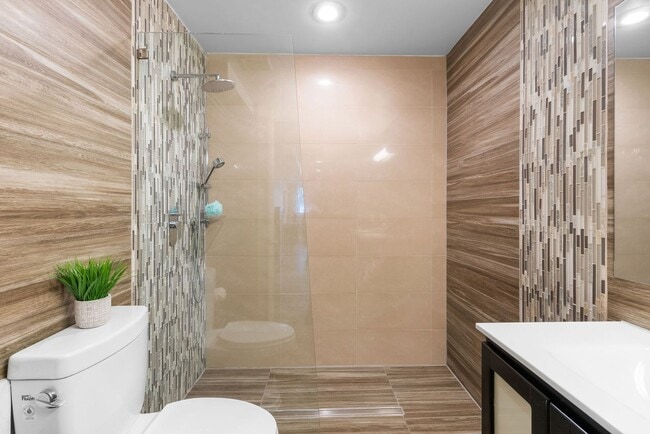 Building Photo - Stylish 2-Level Condo with Private Yard & Chef’s Kitchen Near Petworth Metro!