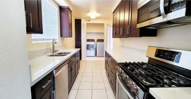 remodeled kitchen w/ stainless steel appliances - 441 N Oakhurst Dr