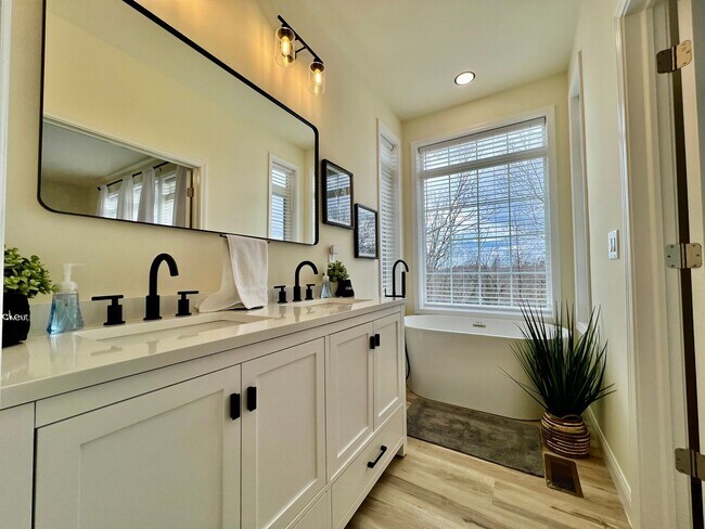 Building Photo - Beautiful NEW Ranch Home with a large deck & games