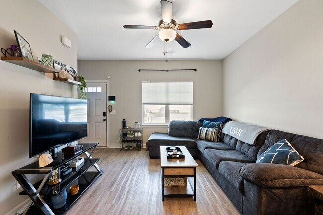 Building Photo - Available Now! Enjoy low-maintenance coastal living in this beautiful 2-bedroom, 2.5-bath townhom...