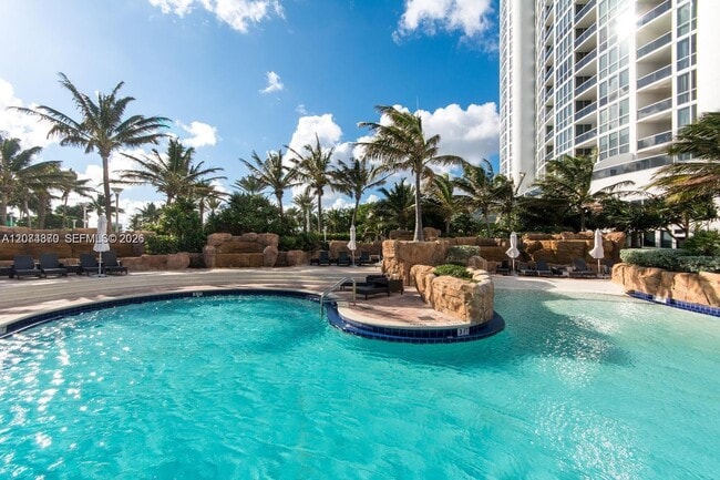 Building Photo - 18201 Collins Ave
