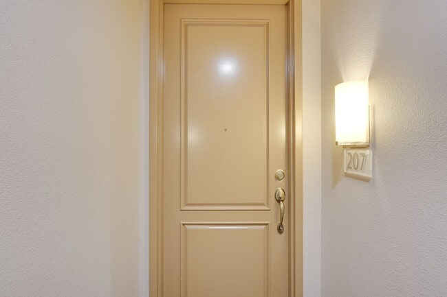 Building Photo - Luxury Guard-Gated 2-Bedroom Condo with Private Garage & Resort Amenities!