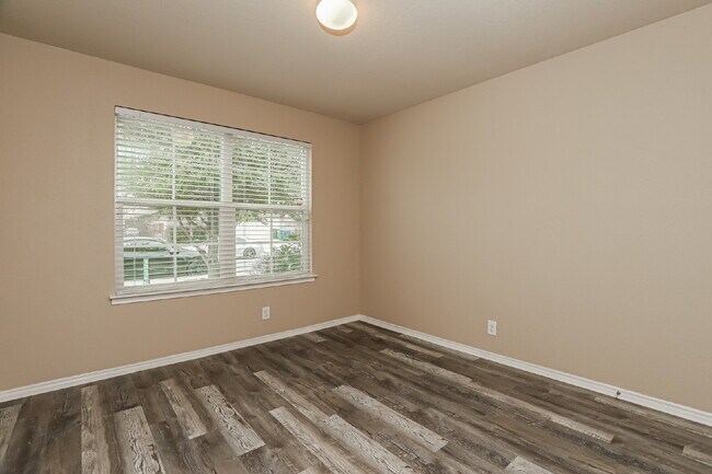 Building Photo - "Charming 4-Bed Sanctuary on Live Oak Pass with Modern Granite Finishes!"