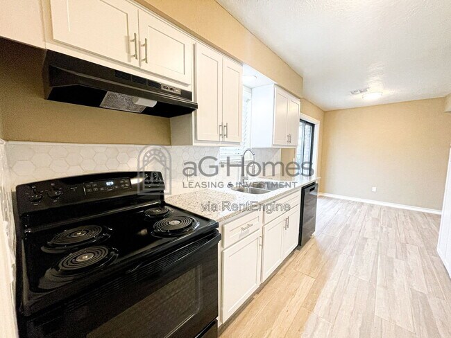 Building Photo - 8412 S Douglas Ave