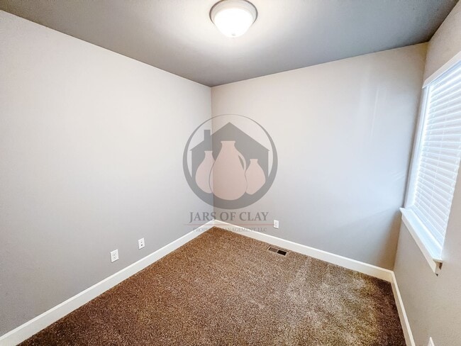 Building Photo - Charming Newer Construction Townhome-Move ...