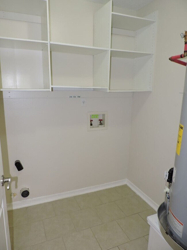 Building Photo - Easy access to shopping, interstate & Navy Federal complex!