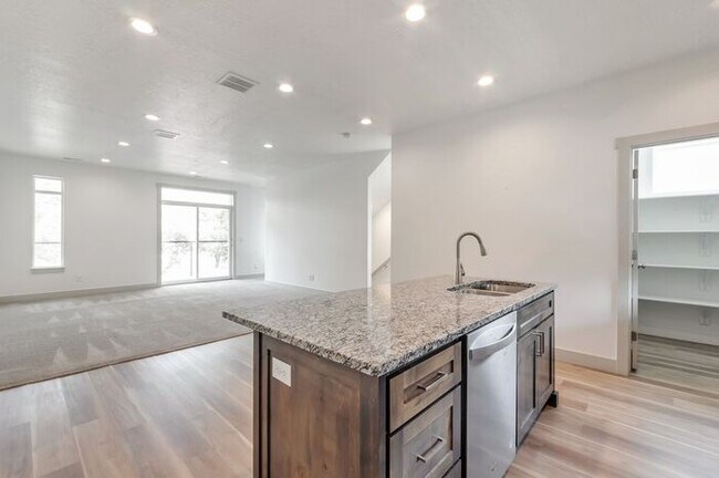 Building Photo - Modern End Unit townhouse w attached 2 car...