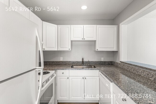 Building Photo - 5642 River Rd