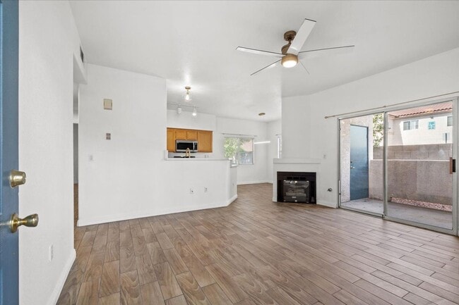 Building Photo - Charming 2-Bedroom First Floor Featuring Open Layout, Fireplace, Patio & Community Pool