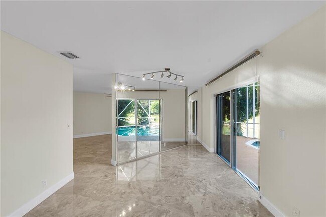 Building Photo - 5911 NW 59th Ave