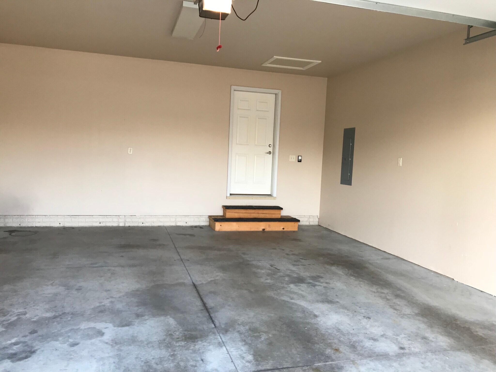 large 2 stall garage with entrance to kitchen. - 104 Scenic Drive