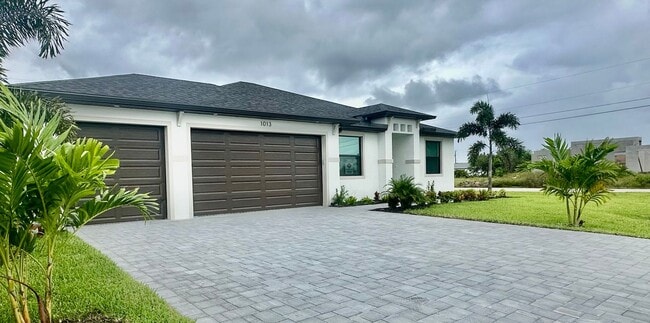 Building Photo - Brand New Construction Home in NE Cape Coral with a Pool on a Corner Lot