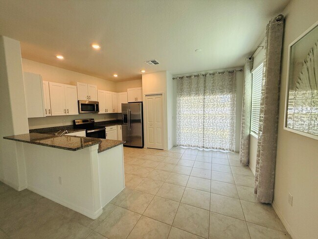 Building Photo - Townhouse in Land O' Lakes - The Townes at Lake Thomas