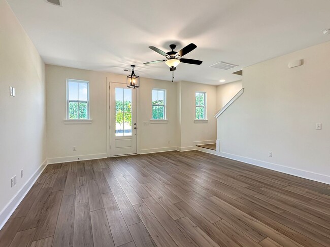 Building Photo - Beautiful, 3-Bedroom Midtown Nexton Townhome with Garage & Amenities