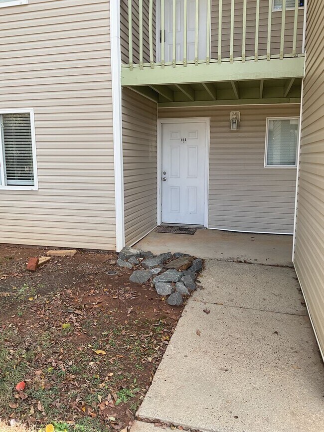 Building Photo - Just off the main road, but in walking dis...