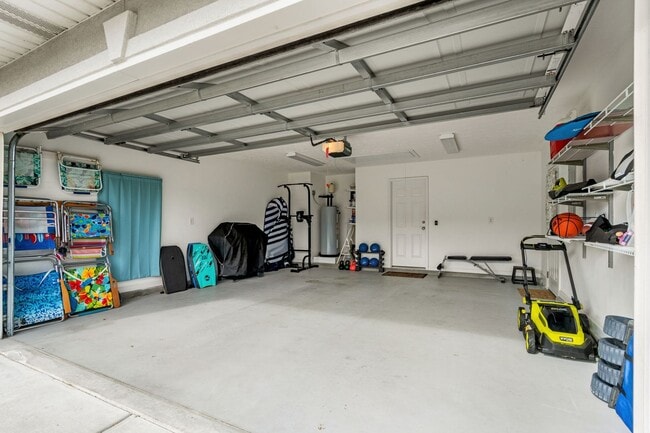 Building Photo - Live the Coastal Lifestyle in This Cypress Keys Beauty!