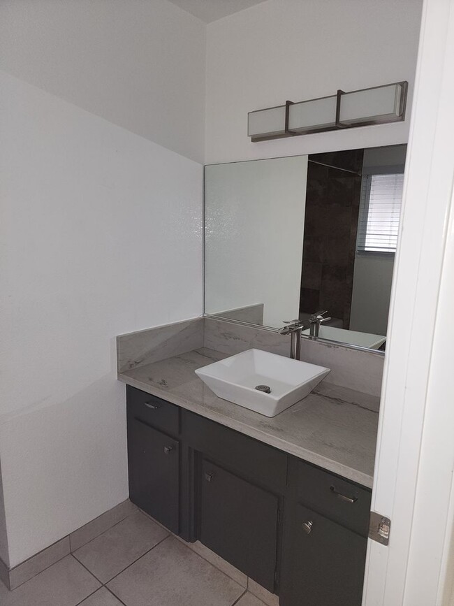 Building Photo - 3 Bedroom 2 bath with 2 car garage off of ...