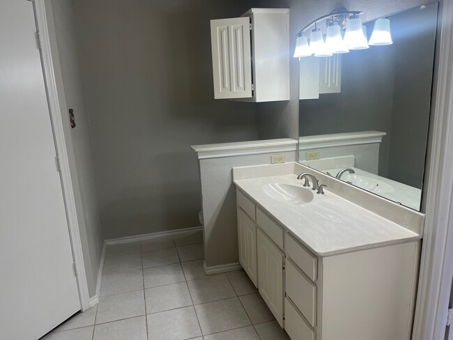 Master bath his vanity - 2213 Oak Bluff Dr