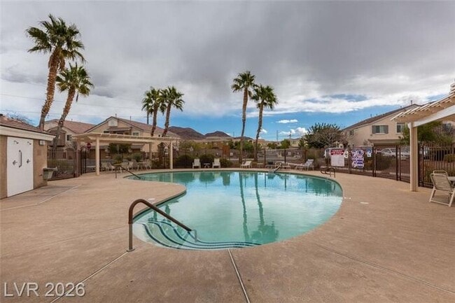 Building Photo - Cozy Gated Townhome with Private Yard, 2-Car Garage & Community Pool!