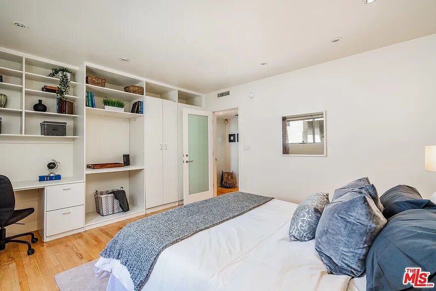 Second Bedroom Built In Desk, Shelves, and Closet - 1410 S Bentley Ave