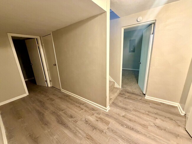 Building Photo - Modern Comforts Await: Spacious Rental with 2-Car Garage, Private Office, and Finished Basement w...
