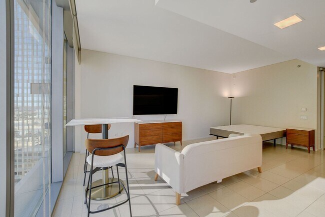 Building Photo - Stunning Strip Views from this Fully Furnished Studio Residence.