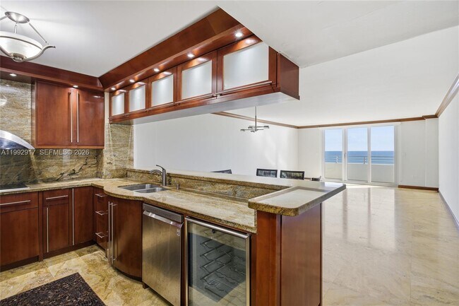 Building Photo - 5555 Collins Ave