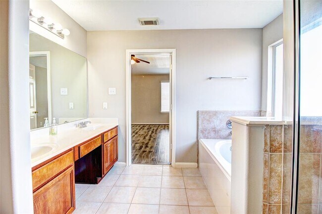 Building Photo - 17018 Midnight Sun Ln