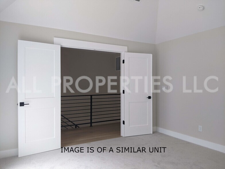 Building Photo - 8059 W 52nd Dr