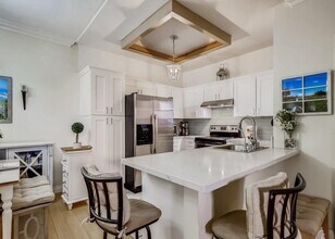 Building Photo - Charming Condo in Prime Location - Upgraded Kitchen, Abundant Amenities, and Award-Winning Schools!